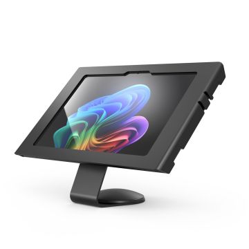 Vue latérale du support de table Compulocks Core Apex pour Microsoft Surface Pro 11, avec un écran coloré visible.