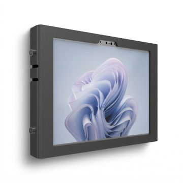 Vue latérale du support mural Compulocks Apex pour Microsoft Surface Pro 11, avec une finition noire élégante et des détails de montage visibles.
